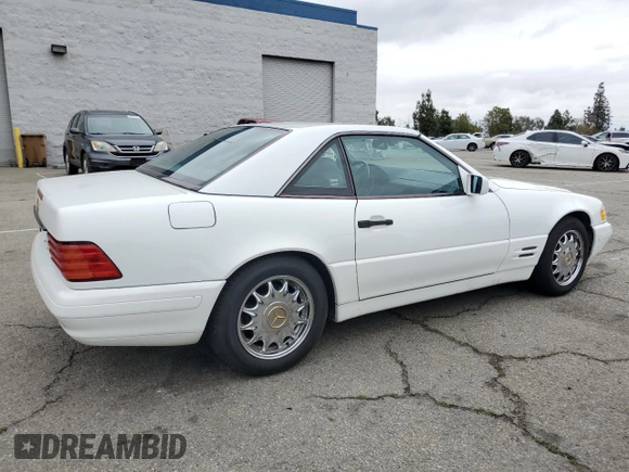 1997 Mercedes-Benz SL 500 with VIN WDBFA63F5VF143197, listed as a Copart auction lot 45003735 with 100,252 mi miles and Salvage title. Bid and sale history available at DreamBid. Image 3.