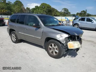 2005 GMC Envoy SLE with VIN 1GKDS13S752277744, listed as a Copart auction lot 51236965 with 248,950 mi miles and Salvage Title. Bid and sale history available at carsss.com. Image 4.