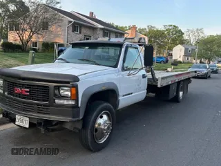 2000 GMC Sierra 1500 with VIN 1GDKC34F9YF421333, listed as a Copart auction lot 57167145 with 120,490 mi miles and Clean Title. Bid and sale history available at DreamBid. Image 2.