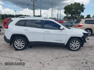 2017 Jeep Cherokee Limited z VIN 1C4PJLDB8HW596380, wystawiony jako IAAI lot #42607357 z przebiegiem 33 407 mil mil oraz . Historia ofert i sprzedaży dostępna na DreamBid. Obrazek 14.