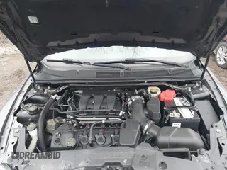 2015 Ford Taurus Limited with VIN 1FAHP2J88FG153326, listed as a IAAI auction lot 41465344 with 98,727 mi miles. Bid and sale history available at carsss.com. Image 10.