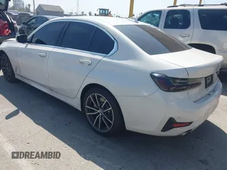 2019 BMW 3 Series 330i with VIN WBA5R1C50KFH26305, listed as a IAAI auction lot 41965645 with 71,150 mi miles and . Bid and sale history available at DreamBid. Image 3.