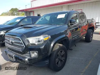 2017 Toyota Tacoma SR5 with VIN 5TFAZ5CN0HX053573, listed as a IAAI auction lot 41797867 with 102,628 mi miles and . Bid and sale history available at DreamBid. Image 2.