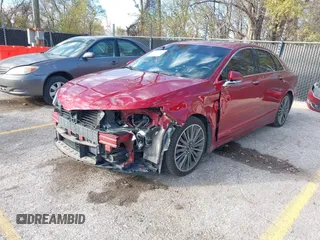 2016 Lincoln MKZ with VIN 3LN6L2JK1GR600996, listed as a IAAI auction lot 40903544 with 152,902 mi miles and . Bid and sale history available at DreamBid. Image 18.