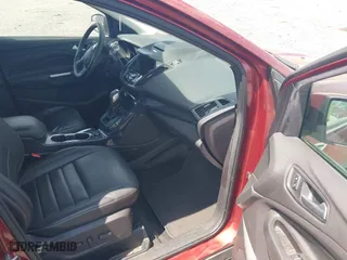 2015 Ford Escape Titanium with VIN 1FMCU0JX5FUB77475, listed as a IAAI auction lot 42103388 with 113,018 mi miles. Bid and sale history available at carsss.com. Image 5.