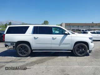 2017 Chevrolet Suburban LT z VIN 1GNSKHKC7HR325641, wystawiony jako IAAI lot #42290768 z przebiegiem 91 802 mil mil oraz . Historia ofert i sprzedaży dostępna na DreamBid. Obrazek 14.