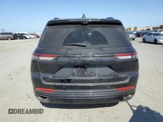 2023 Jeep Grand Cherokee Summit Reserve z VIN 1C4RJYE62PC652630, wystawiony jako Copart lot #55110525 z przebiegiem 21 186 mil mil oraz Szkoda całkowita • Salvage title. Historia ofert i sprzedaży dostępna na DreamBid. Obrazek 6.