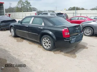 2010 Chrysler 300 Touring with VIN 2C3CA5CV0AH329717, listed as a IAAI auction lot 41785694 with 257,072 mi miles. Bid and sale history available at carsss.com. Image 3.