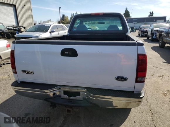 2002 Ford F-150 XL with VIN 1FTRF17W92NB42259, listed as a Copart auction lot 52986475 with 117,746 mi miles and Salvage title. Bid and sale history available at DreamBid. Image 6.