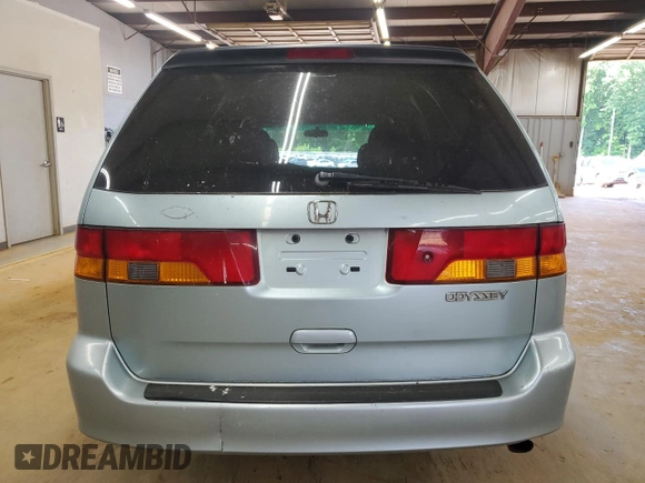 2004 Honda Odyssey EX-L z VIN 5FNRL18044B020316, wystawiony jako Copart lot #56027435 z przebiegiem 192 429 mil mil oraz Szkoda całkowita • Salvage title. Historia ofert i sprzedaży dostępna na DreamBid. Obrazek 6.
