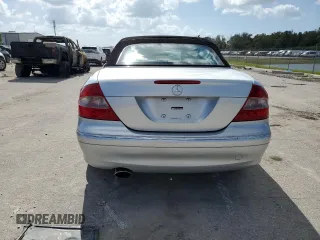 2009 Mercedes-Benz CLK-Class 3.5L with VIN WDBTK56F69T105071, listed as a Copart auction lot 77170654 with 70,688 mi miles and Salvage Title. Bid and sale history available at carsss.com. Image 6.