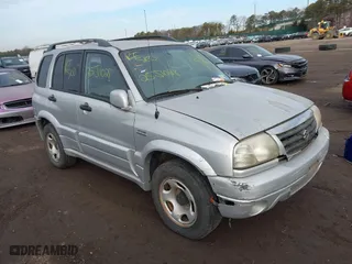 2002 Suzuki Grand Vitara JLX with VIN JS3TD62V724153257, listed as a IAAI auction lot 41452635 with 999,999 mi miles. Bid and sale history available at carsss.com. Image 1.