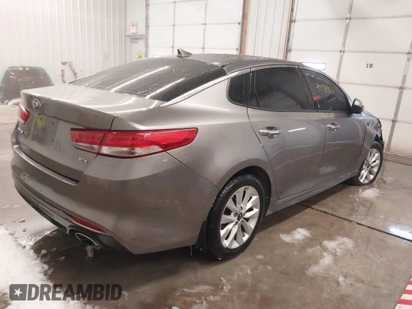 2017 Kia Optima EX with VIN 5XXGU4L36HG143321, listed as a IAAI auction lot 41589617 with 116,972 mi miles. Bid and sale history available at carsss.com. Image 4.