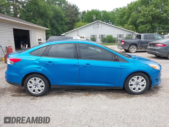 2015 Ford Focus SE z VIN 1FADP3F21FL274182, wystawiony jako IAAI lot #42441161 z przebiegiem 176 810 mil mil oraz . Historia ofert i sprzedaży dostępna na DreamBid. Obrazek 14.
