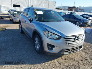 2016 Mazda CX-5 Touring with VIN JM3KE2CY6G0617055, listed as a IAAI auction lot 41740553 with 87,984 mi miles. Bid and sale history available at carsss.com. Image 1.