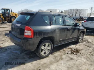 2010 Jeep Compass Sport with VIN 1J4NF4FB2AD591523, listed as a Copart auction lot 48809775 with 105,720 mi miles and Salvage Title. Bid and sale history available at carsss.com. Image 3.