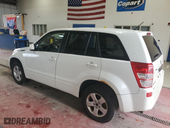2013 Suzuki Grand Vitara Premium with VIN JS3TD0D64D4100568, listed as a Copart auction lot 63958985 with 140,668 mi miles and Salvage title. Bid and sale history available at DreamBid. Image 2.