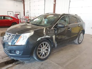2014 Cadillac SRX Premium Collection z VIN 3GYFNGE38ES606731, wystawiony jako IAAI lot #41844450 z przebiegiem 156 541 mil mil oraz . Historia ofert i sprzedaży dostępna na DreamBid. Obrazek 2.