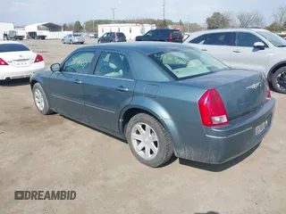 2005 Chrysler 300 with VIN 2C3JA53G35H157178, listed as a IAAI auction lot 41849007 with 149,247 mi miles. Bid and sale history available at carsss.com. Image 3.