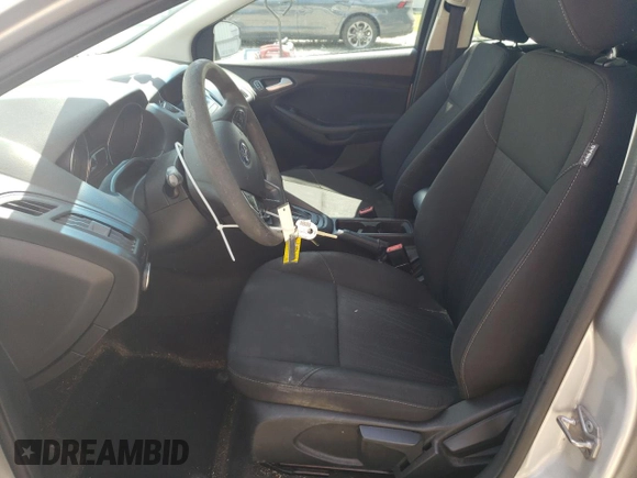 2017 Ford Focus SE with VIN 1FADP3F27HL269104, listed as a Copart auction lot 57509935 with 174,015 mi miles and Clean title. Bid and sale history available at DreamBid. Image 7.