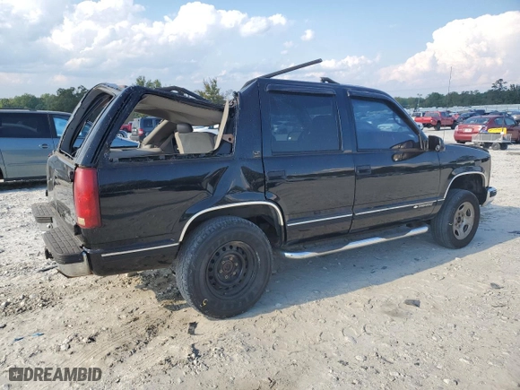 1999 Chevrolet Tahoe Z71 with VIN 1GNEK13R1XJ380316, listed as a Copart auction lot 68505524 with 242,542 mi miles and Salvage Title. Bid and sale history available at carsss.com. Image 3.