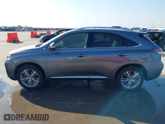 2015 Lexus RX 350 with VIN JTJZK1BA1F2420762, listed as a IAAI auction lot 42085592 with 104,146 mi miles and . Bid and sale history available at DreamBid. Image 14.