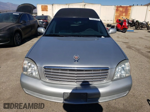 2003 Cadillac DTS Professional 1SH z VIN 1GEEH00Y93U500263, wystawiony jako Copart lot #77037214 z przebiegiem 63 197 mil mil oraz Tytuł czysty. Historia ofert i sprzedaży dostępna na DreamBid. Obrazek 5.