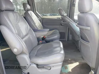 1999 Chrysler Town & Country LXi with VIN 1C4GP54L3XB899589, listed as a IAAI auction lot 41792430 with 248,850 mi miles. Bid and sale history available at carsss.com. Image 8.