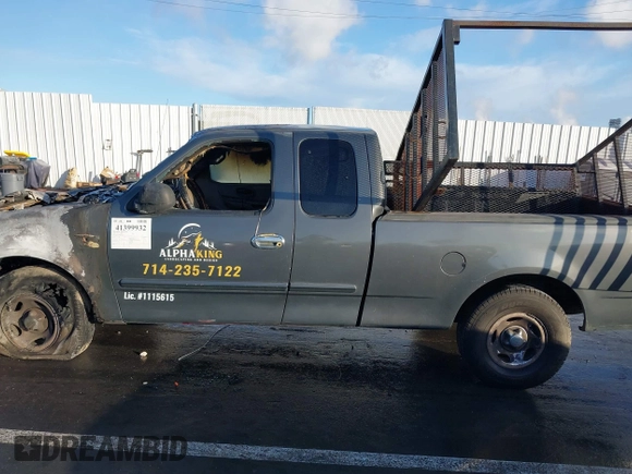 2001 Ford F-150 XL z VIN 1FTRX17W91NA11375, wystawiony jako IAAI lot #41399932 z przebiegiem Nie podano mil oraz . Historia ofert i sprzedaży dostępna na DreamBid. Obrazek 13.