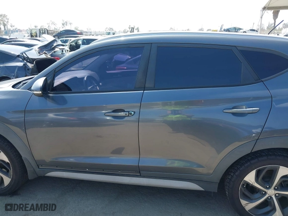 2017 Hyundai Tucson Value with VIN KM8J33A26HU385271, listed as a IAAI auction lot 42090148 with 95,170 mi miles. Bid and sale history available at carsss.com. Image 14.