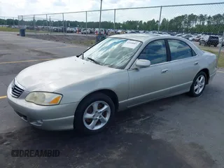 2002 Mazda Millenia with VIN JM1TA221721722364, listed as a IAAI auction lot 42160683 with 166,778 mi miles and . Bid and sale history available at DreamBid. Image 2.