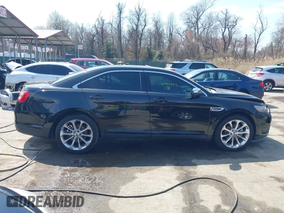 2014 Ford Taurus Limited with VIN 1FAHP2F80EG104984, listed as a IAAI auction lot 41910463 with 174,034 mi miles. Bid and sale history available at carsss.com. Image 13.