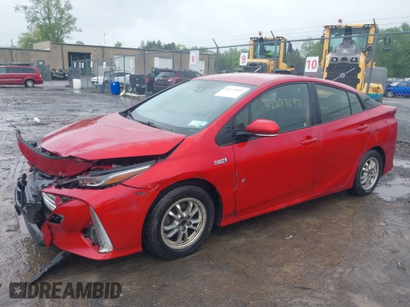 2021 Toyota Prius LE with VIN JTDKAMFP7M3178008, listed as a IAAI auction lot 42273697 with 110,605 mi miles and . Bid and sale history available at DreamBid. Image 2.