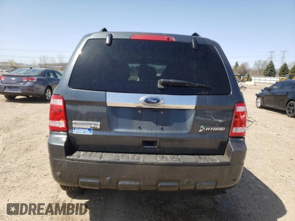2010 Ford Escape Hybrid z VIN 1FMCU4K32AKB79563, wystawiony jako Copart lot #52892885 z przebiegiem 177 008 mil mil oraz Szkoda całkowita • Salvage title. Historia ofert i sprzedaży dostępna na DreamBid. Obrazek 6.