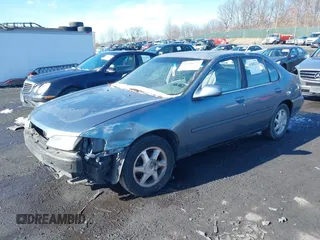 1999 Nissan Altima XE with VIN 1N4DL01D3XC273197, listed as a IAAI auction lot 41508232 with 168,658 mi miles. Bid and sale history available at carsss.com. Image 2.