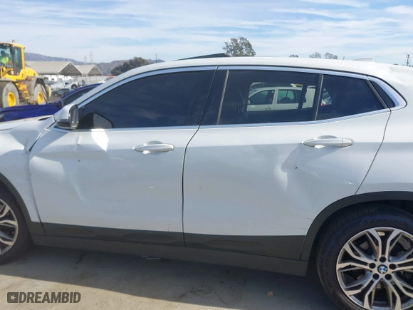 2020 BMW X2 sDrive28i with VIN WBXYH9C01L5P15004, listed as a IAAI auction lot 41128060 with 86,052 mi miles. Bid and sale history available at carsss.com. Image 13.