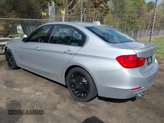 2015 BMW 3 Series 328i with VIN WBA3A5G54FNS83410, listed as a IAAI auction lot 41942681 with 115,340 mi miles. Bid and sale history available at carsss.com. Image 3.