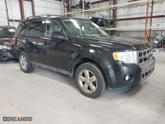 2011 Ford Escape Limited with VIN 1FMCU0EG0BKB30015, listed as a IAAI auction lot 41987953 with 203,057 mi miles. Bid and sale history available at carsss.com. Image 1.