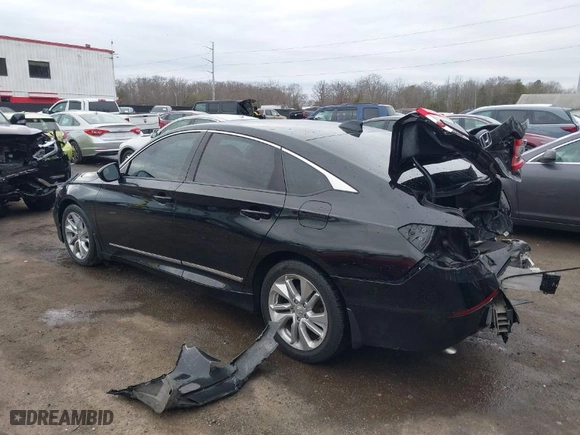 2018 Honda Accord Sedan LX 1.5T with VIN 1HGCV1F10JA182557, listed as a IAAI auction lot 41125636 with 114,760 mi miles. Bid and sale history available at carsss.com. Image 3.