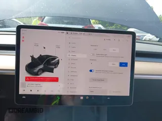 2021 Tesla Model Y Long Range z VIN 5YJYGAEE7MF146315, wystawiony jako IAAI lot #42445336 z przebiegiem 57 110 mil mil oraz . Historia ofert i sprzedaży dostępna na DreamBid. Obrazek 18.