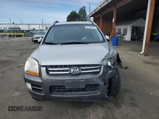 2005 Kia Sportage LX with VIN KNDJE723457117231, listed as a Copart auction lot 50163165 with 97,273 mi miles and Salvage Title. Bid and sale history available at carsss.com. Image 5.