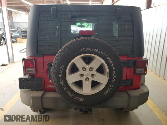 2012 Jeep Wrangler Unlimited Sport z VIN 1C4BJWDG2CL171531, wystawiony jako Copart lot #62181805 z przebiegiem 195 394 mil mil oraz Szkoda całkowita • Salvage title. Historia ofert i sprzedaży dostępna na DreamBid. Obrazek 6.