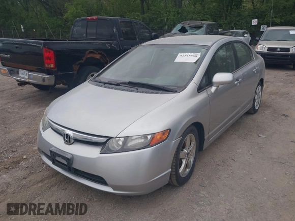 2006 Honda Civic LX with VIN 1HGFA16516L116560, listed as a IAAI auction lot 42145668 with Not Provided miles and . Bid and sale history available at DreamBid. Image 2.