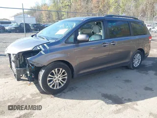 2014 Toyota Sienna XLE with VIN 5TDYK3DC5ES475750, listed as a IAAI auction lot 41976805 with 221,804 mi miles. Bid and sale history available at carsss.com. Image 17.