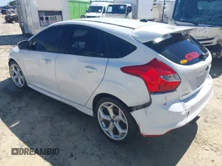 2014 Ford Focus ST with VIN 1FADP3L99EL311771, listed as a IAAI auction lot 41419521 with 124,572 mi miles and . Bid and sale history available at carsss.com. Image 3.