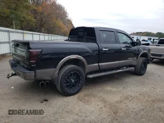 2017 Nissan Titan XD SL with VIN 1N6AA1F41HN548361, listed as a Copart auction lot 84654174 with 142,057 mi miles and Salvage Title. Bid and sale history available at carsss.com. Image 3.
