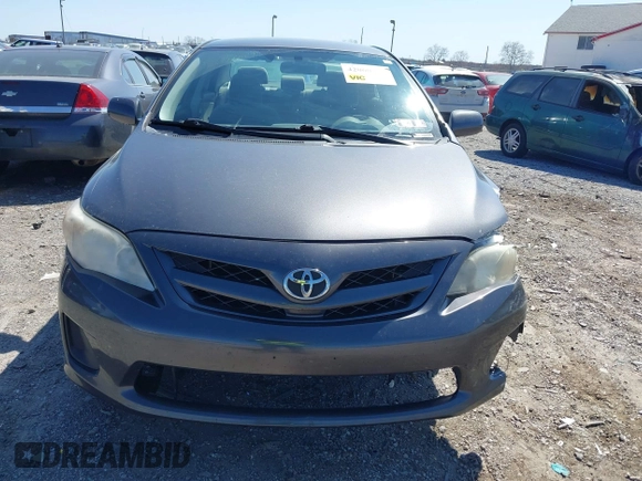 2011 Toyota Corolla L with VIN JTDBU4EE4B9144190, listed as a IAAI auction lot 42060728 with 115,299 mi miles. Bid and sale history available at carsss.com. Image 12.
