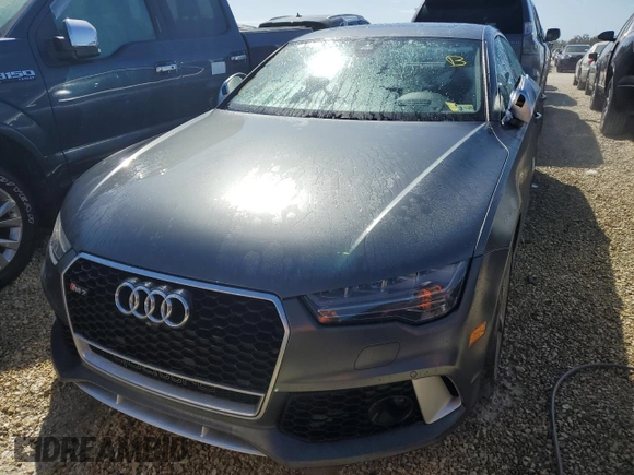 2016 Audi RS 7 Prestige z VIN WUAW2AFC2GN900328, wystawiony jako Copart lot #74450074 z przebiegiem Nie podano mil oraz Nie do naprawy. Historia ofert i sprzedaży dostępna na DreamBid. Obrazek 5.