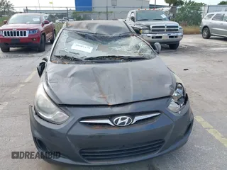 2012 Hyundai Accent GS with VIN KMHCT5AE7CU050253, listed as a IAAI auction lot 40601479 with 88,734 mi miles. Bid and sale history available at carsss.com. Image 6.