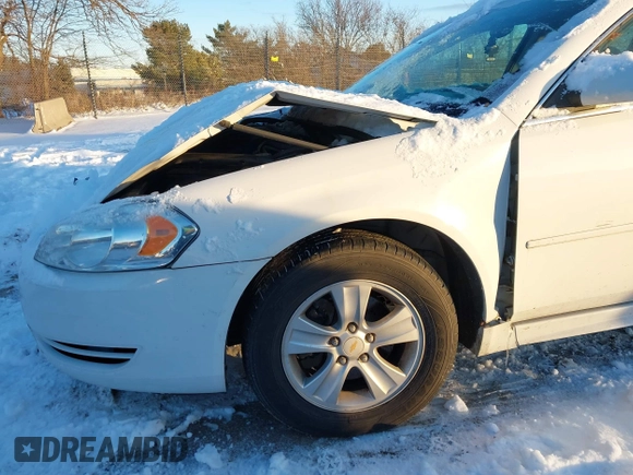 2014 Chevrolet Impala LS with VIN 2G1WA5E39E1171292, listed as a IAAI auction lot 41126083 with Not provided miles and . Bid and sale history available at DreamBid. Image 12.